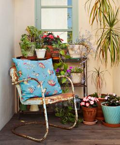 vintage patio chair and potted plants