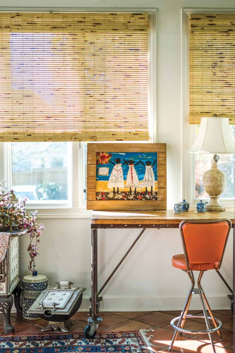 art and bamboo Roman shades in colorful historic Nashville home