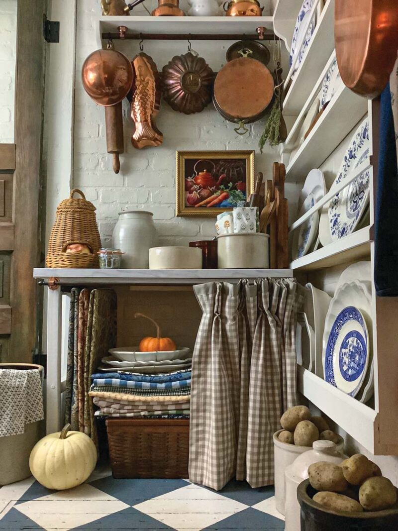 country cottage pantry with copper pots and vintage wares