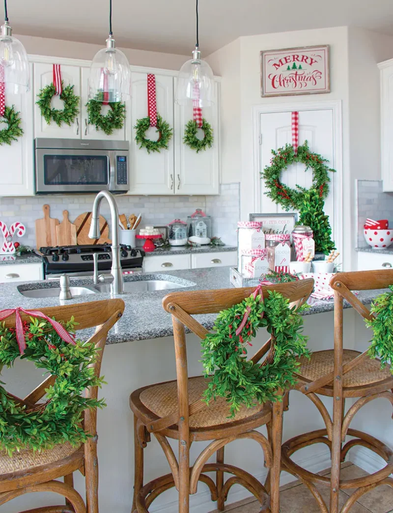 wreaths in kitchen on cabinet fronts and kitchen barstools