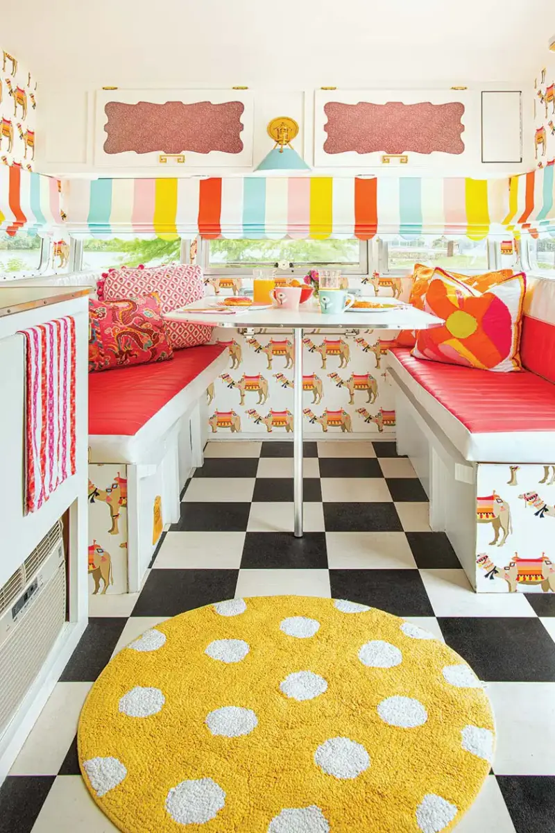 checkered floors and striped curtains with camel wallpaper in colorful camper