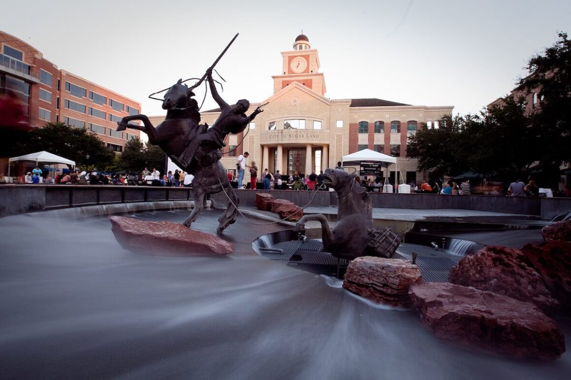 Sugar Land, Texas town square with equestrian statues emerging from fountain