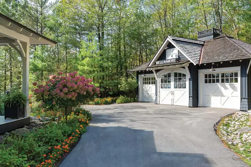 lakeside cottage farmhouse garage with home's name Bellamere on top