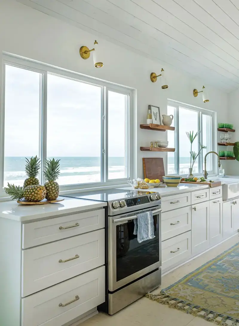 white coastal kitchen with exposed wood shelves