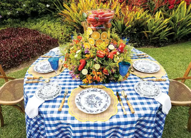 Italian inspired tablescape with peppers, flowers and citrus