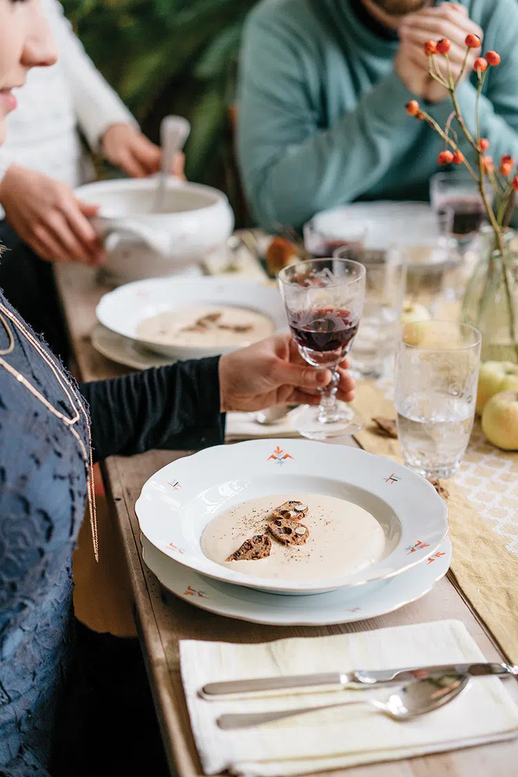 Beer Soup with Sweet Chestnuts served at a table for outdoor fall feasting