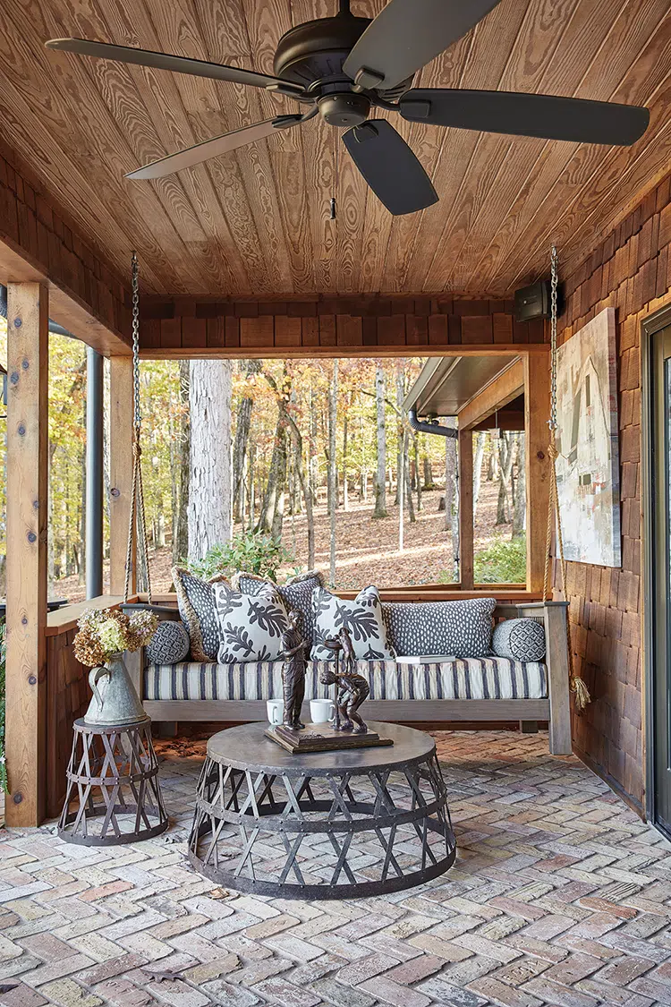 cushioned porch swing in rustic Georgia setting