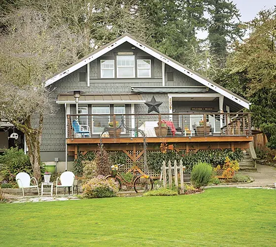 exterior view of cottage on the shores of Puget Sound