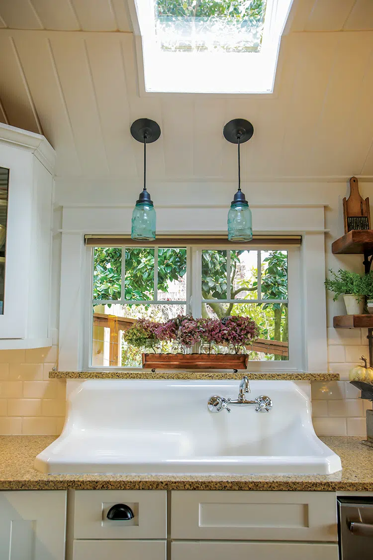 skylight and farmhouse kitchen sink in little cottage on the Sound