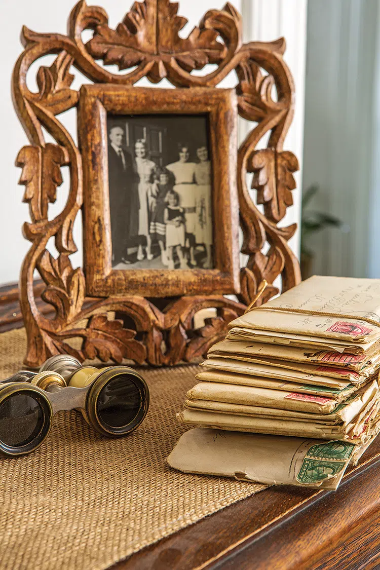 carved wooden photo frame with antique letters and binoculars for a vintage fall vignette