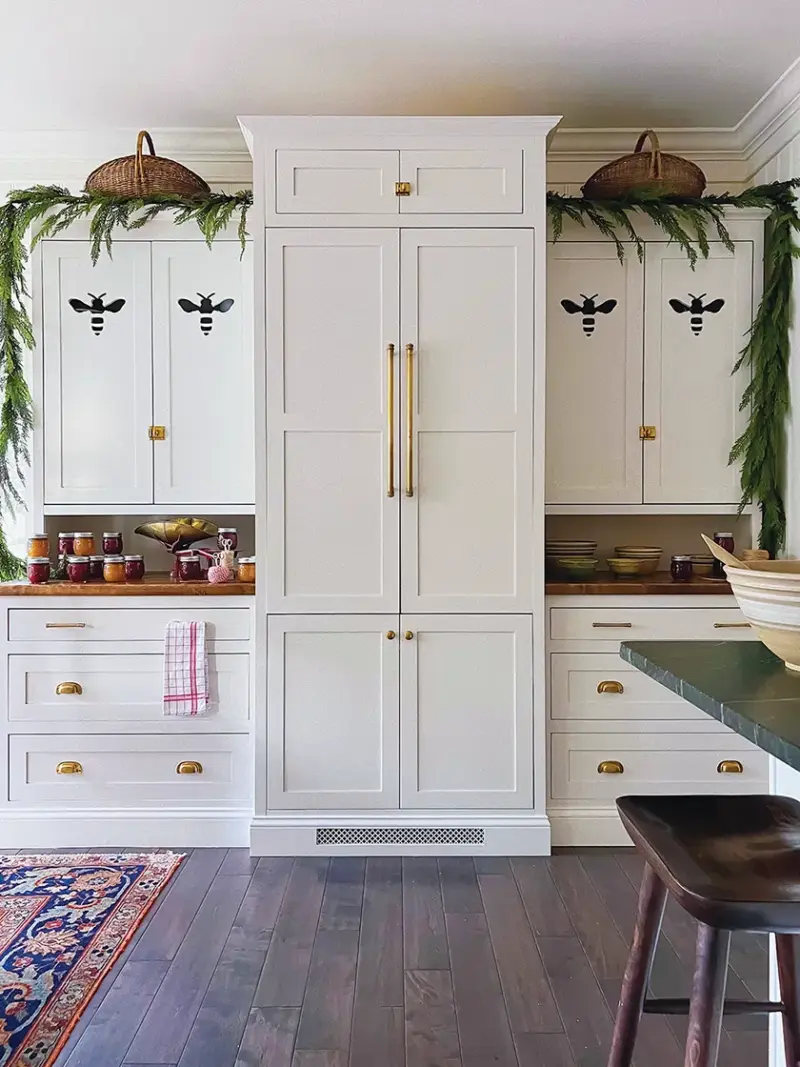 bee-shaped cutouts in kitchen cabinetry at Pantry Hill