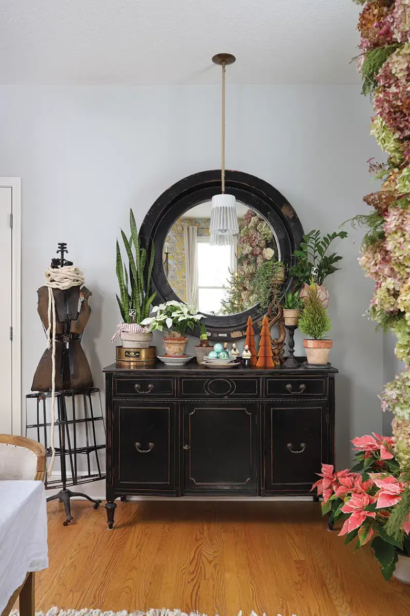 home in Michigan with dried hydrangea garland, poinsettias and small potted tree