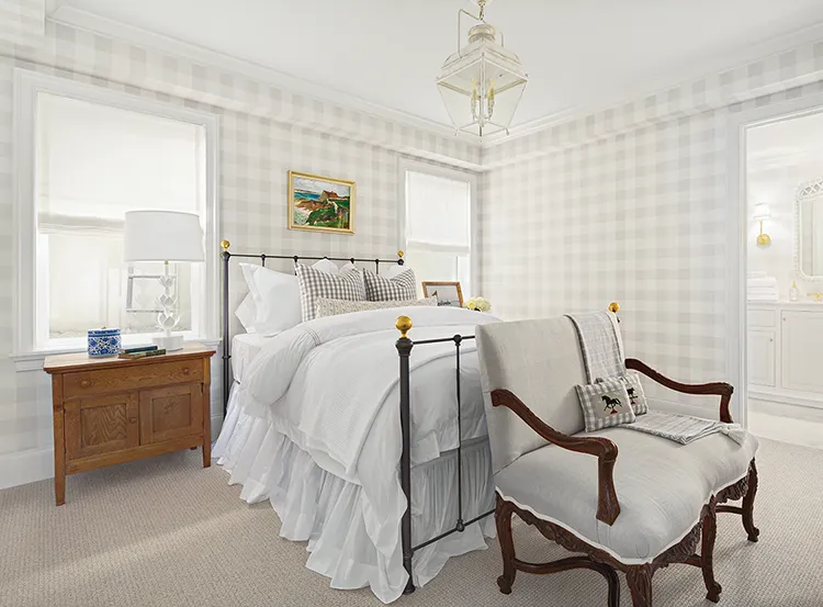 bedroom with white and gray color scheme with view to en suite bathroom in Project House Utah