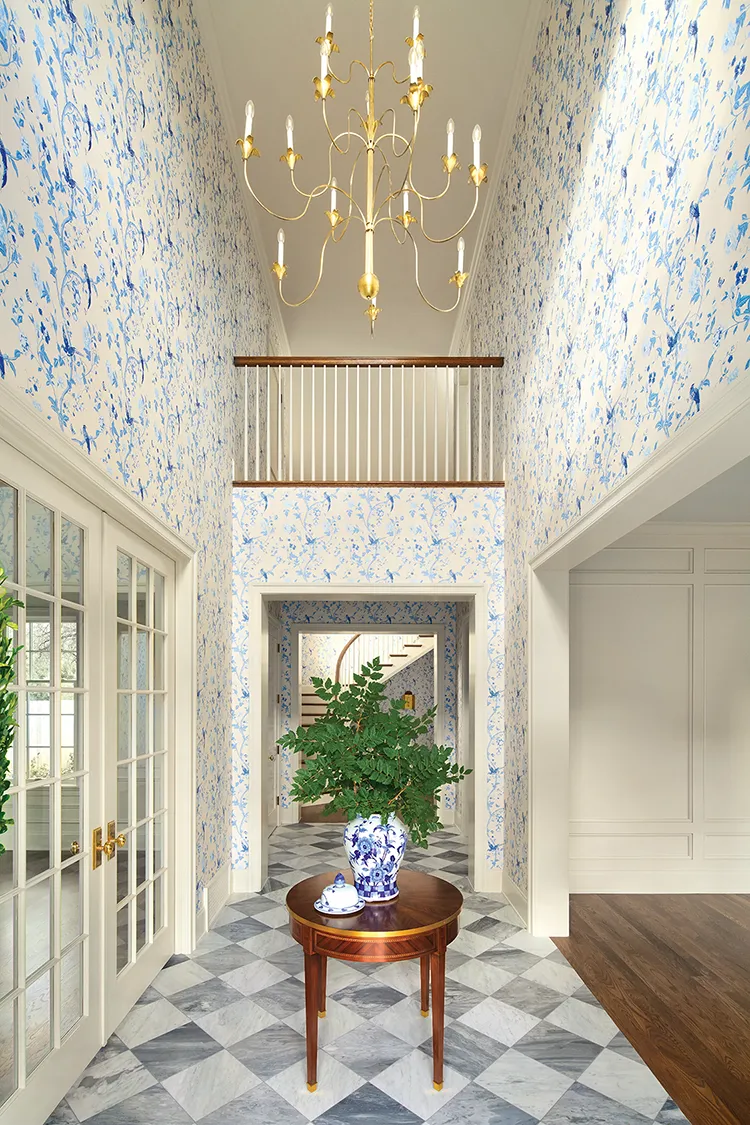 entrayway of Project House Utah home with white and blue wallpaper