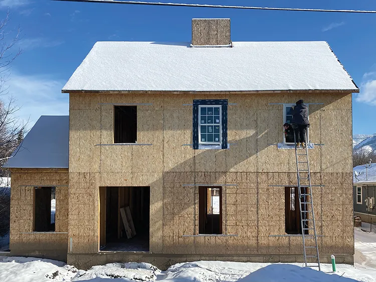 Project House Utah under construction during the winter