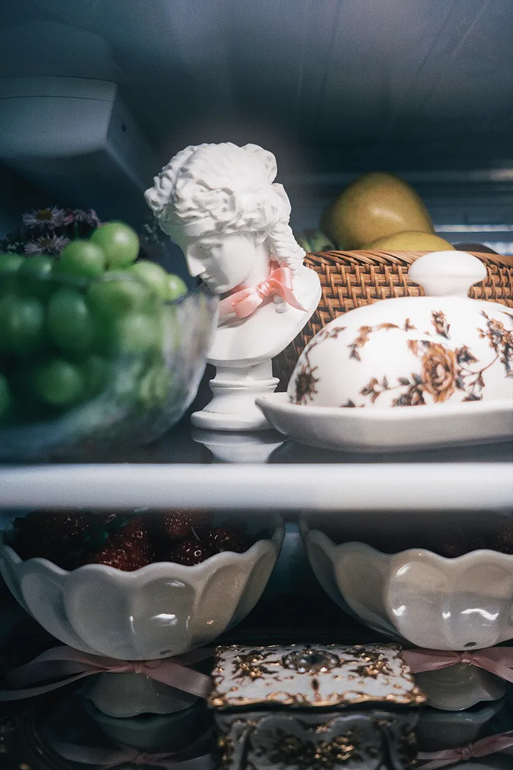 bust adds decorative touch to refrigerator shelves