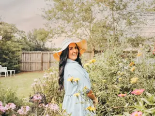 Krystle Nickels, 2025 Brand Ambassador for Cottages and Bungalows, in her garden