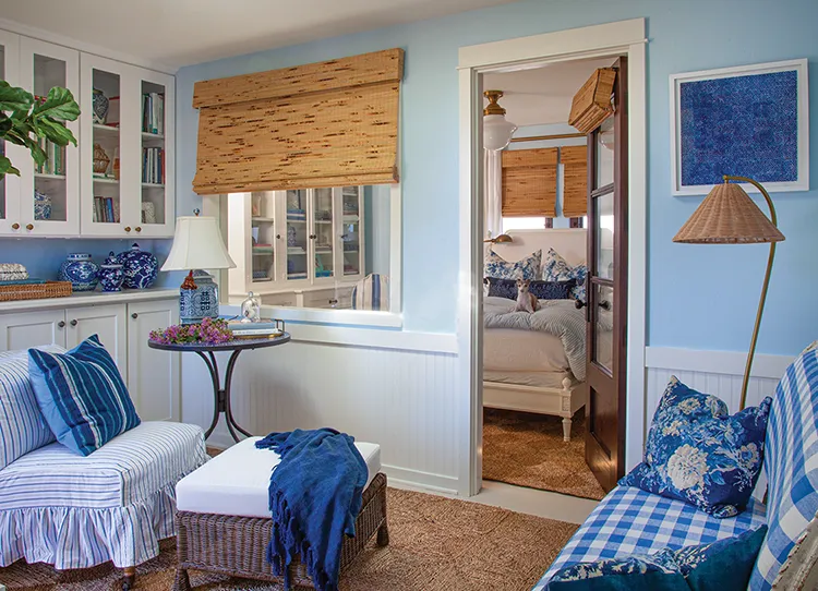 snug sitting area in blue and white coastal cottage