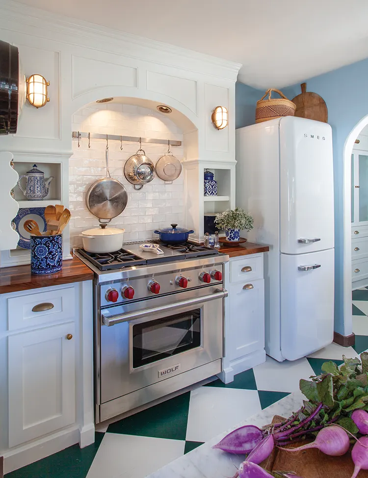 Wolf range in blue and white cottage kitchen