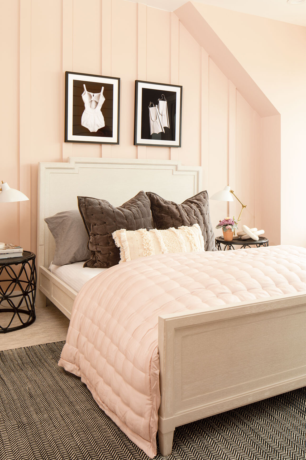 blush pink bedroom with white sheets and pink comforter